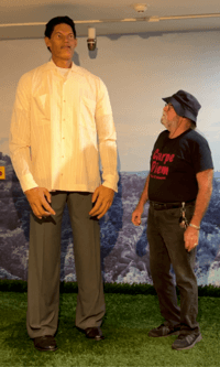 Felipe Birriel Fernández animatronic fugure standing next to Orlando Mergal | “Galería De Los Gigantes”, A Tribute To Talent And Mettle | Puerto Rico By GPS